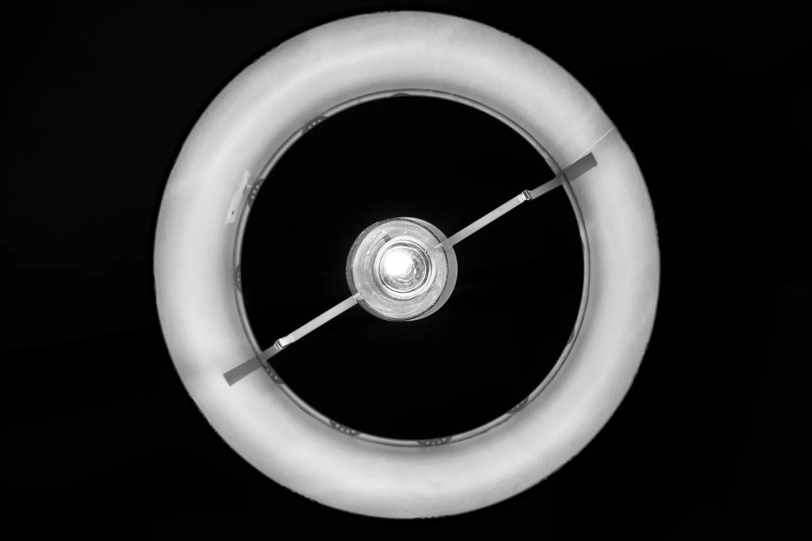 An eye-shaped form watches from an unexpected place above.