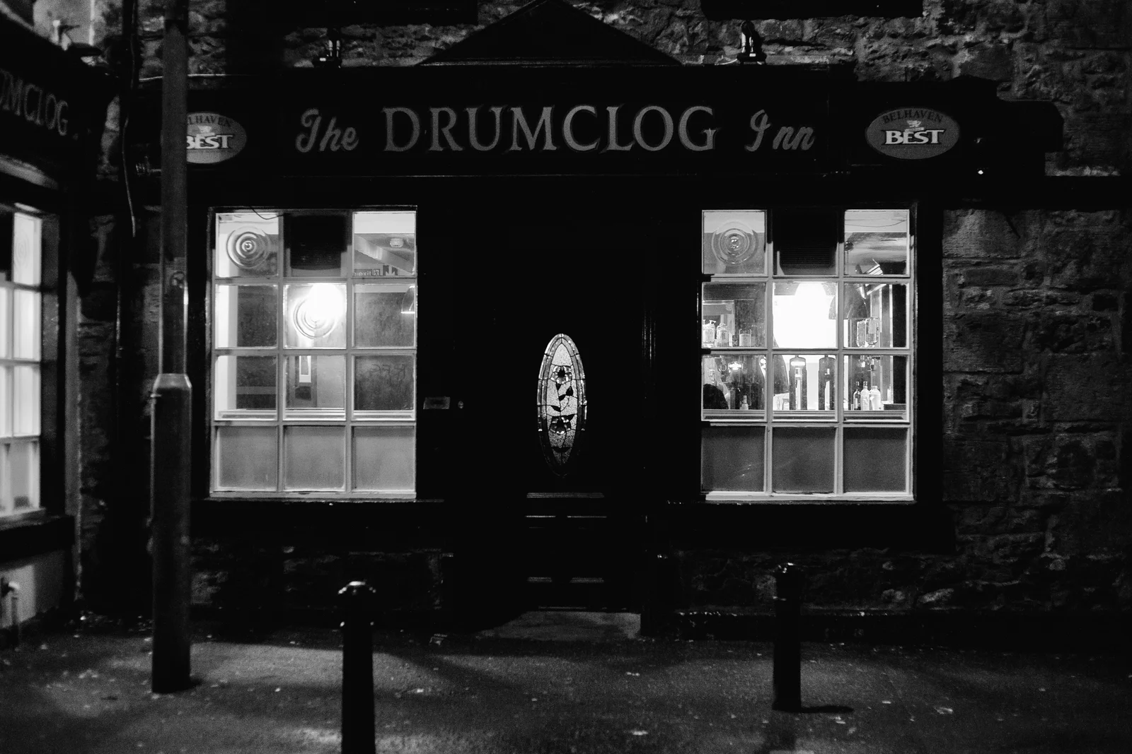 An empty place once used for gathering sits in darkness and stillness.